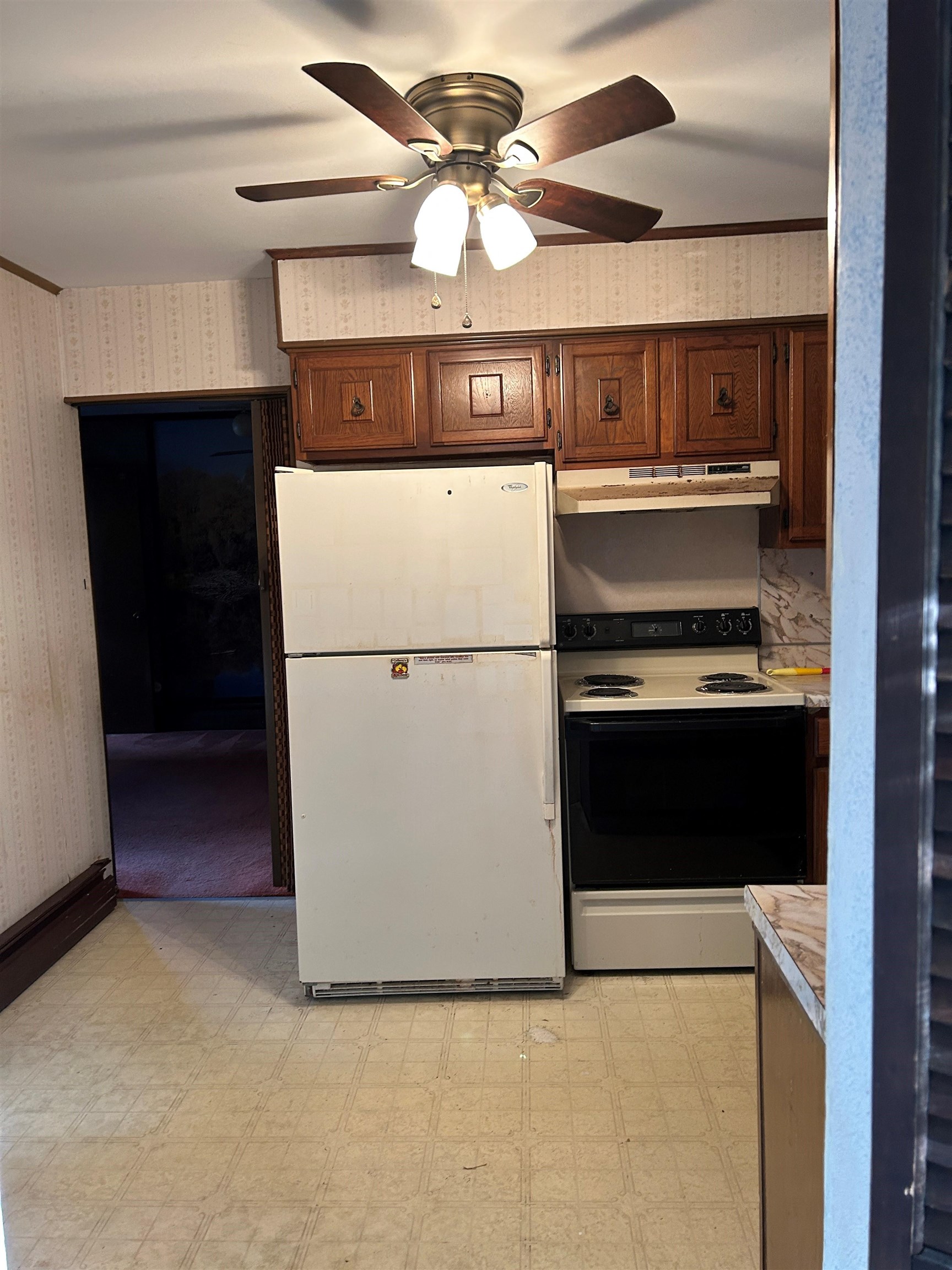 918 Myrna Road Erma, NJ 08204 - Photo 14 of 25 a kitchen with stainless steel appliances a refrigerator and a chandelier