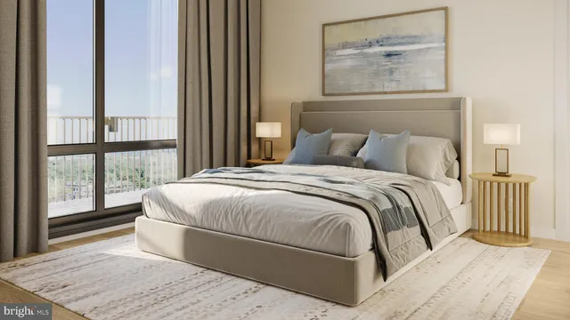 a bed sitting in a bedroom next to a window