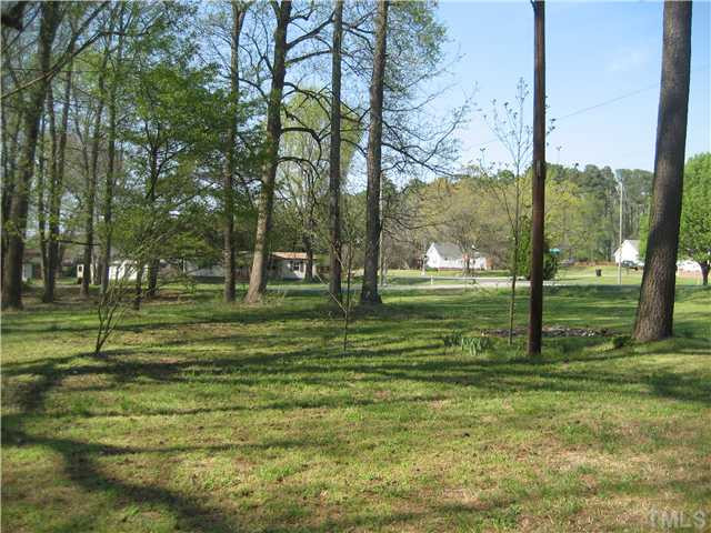 7500 Rock Service Station Road Raleigh, NC 27603 - Photo 19 of 21 Another view of the wooded lot, goes all the way to the street.