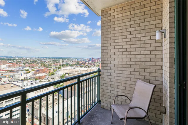 a view of balcony with furniture