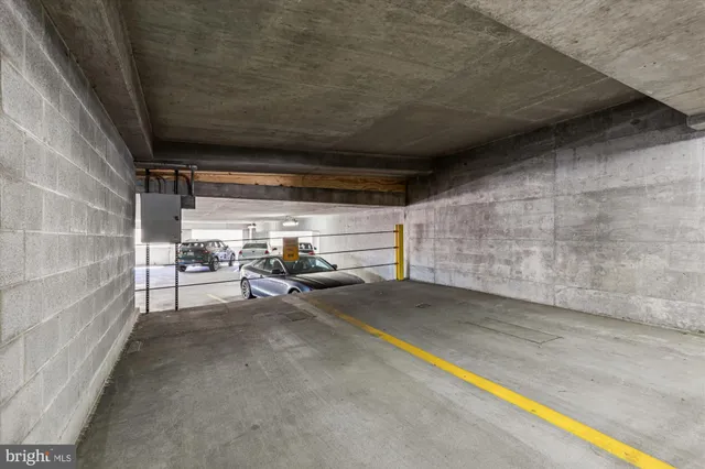 a view of a patio with table and chairs