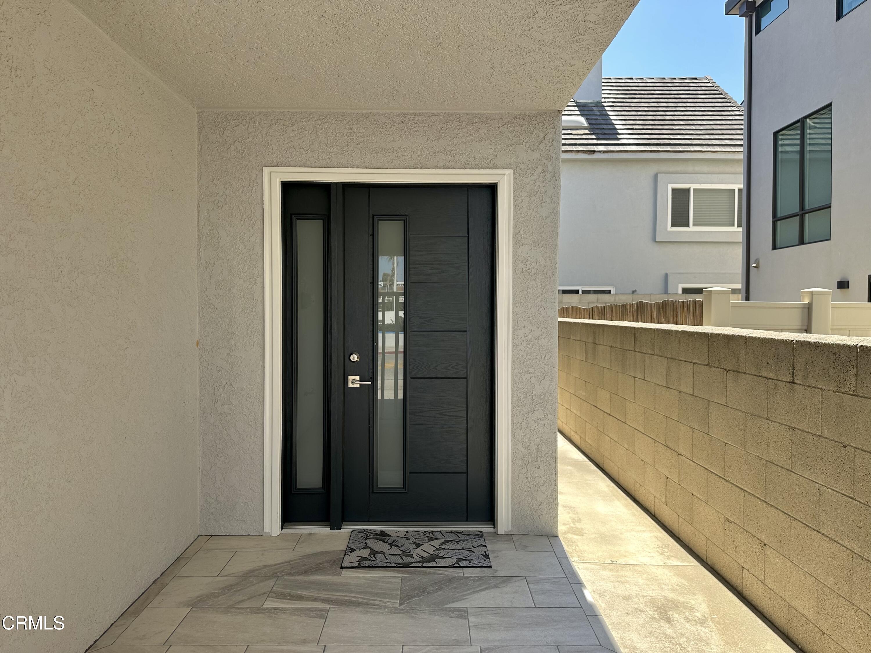 4053 Sunset Lane Oxnard, CA 93035 - Photo 2 of 34 a view of a house with a door