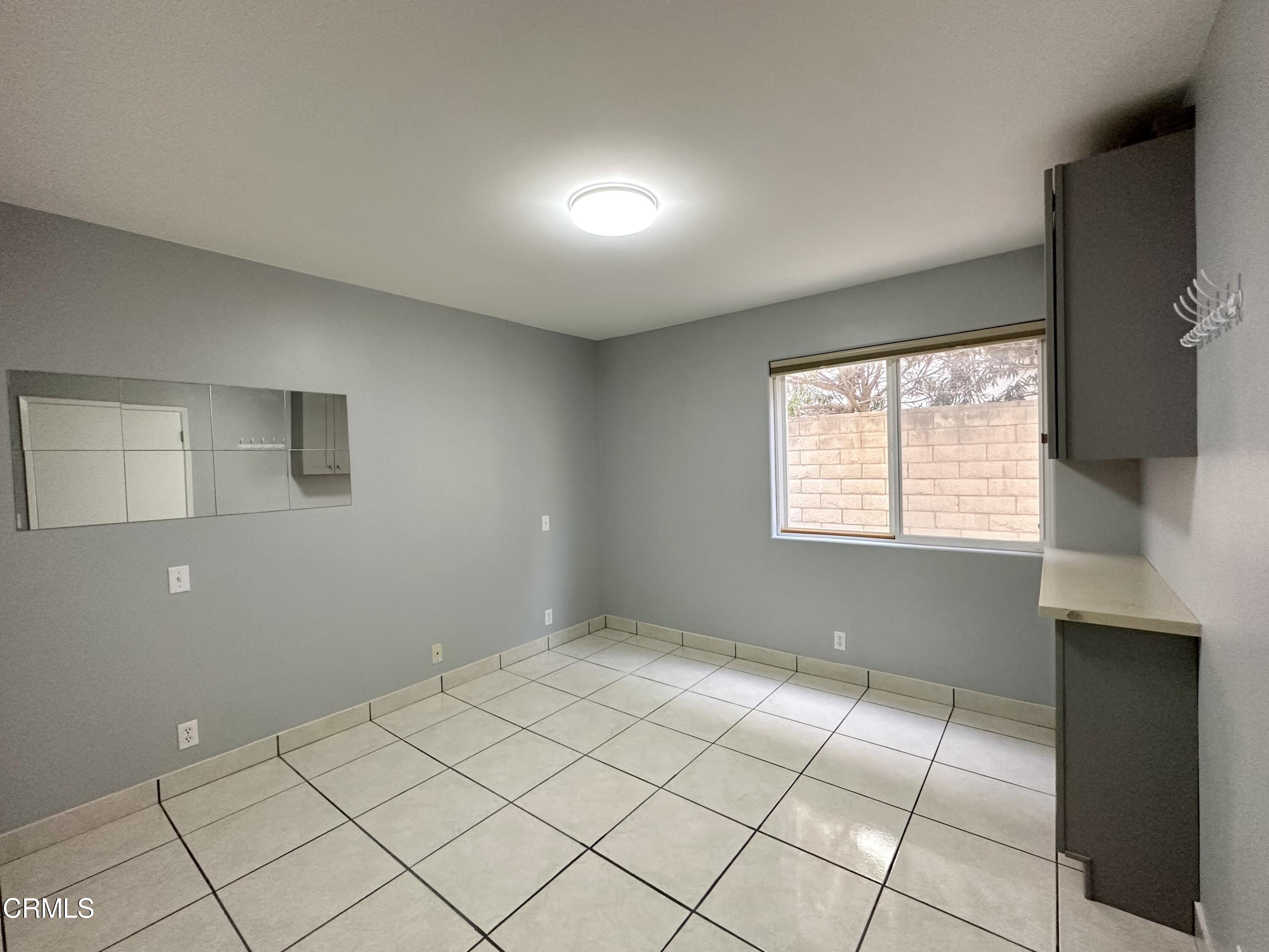 4053 Sunset Lane Oxnard, CA 93035 - Photo 27 of 34 a view of an empty room with a window