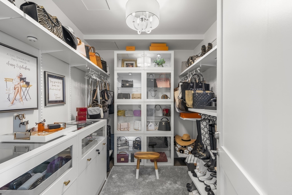 240 Devonshire Street, Unit 3701 Boston, MA 02110 - Photo 19 of 40 a room with storage and utility racks