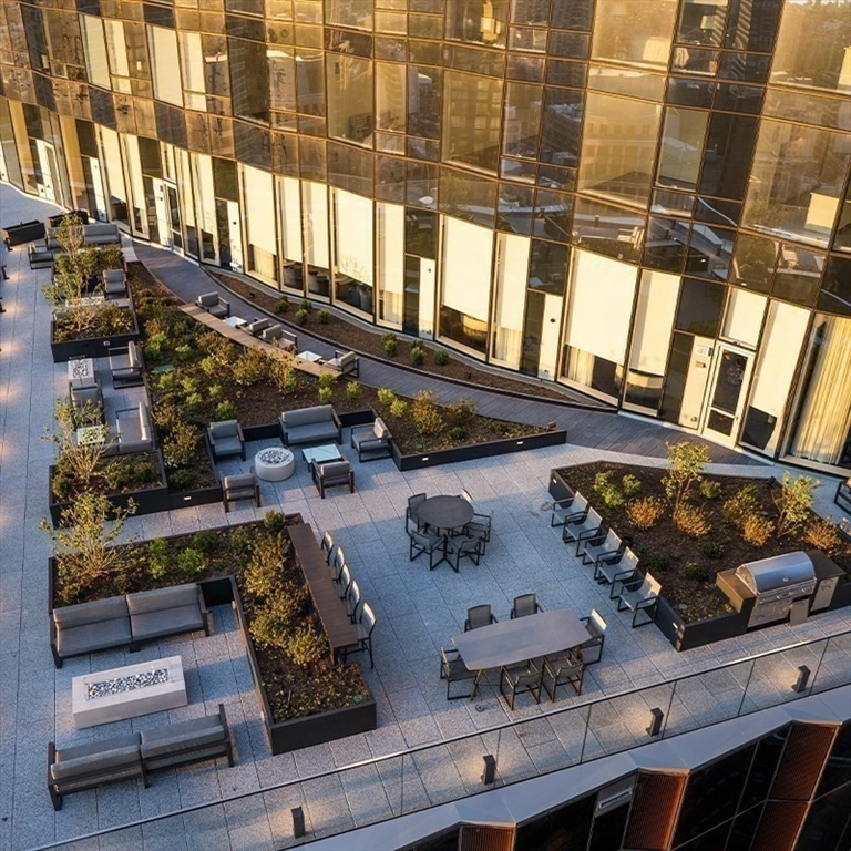 240 Devonshire Street, Unit 3701 Boston, MA 02110 - Photo 36 of 40 a picture of a living room with a rug