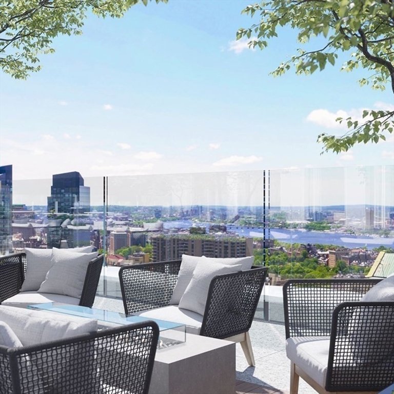 240 Devonshire Street, Unit 3701 Boston, MA 02110 - Photo 37 of 40 a view of a terrace with furniture