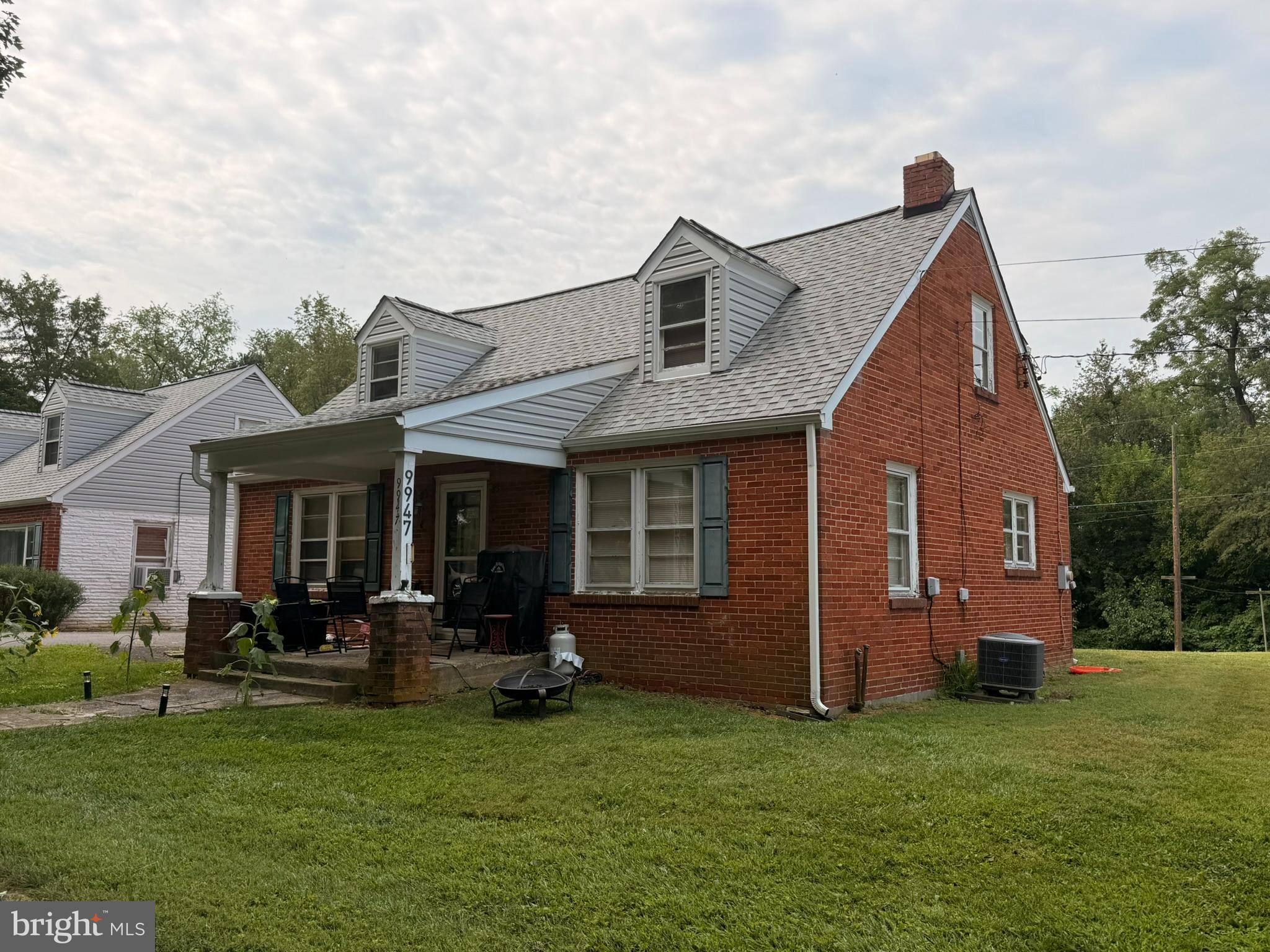 9947 Crossfield Road Hagerstown, MD 21740 - Photo 2 of 39 a view of a house with a yard porch and sitting area