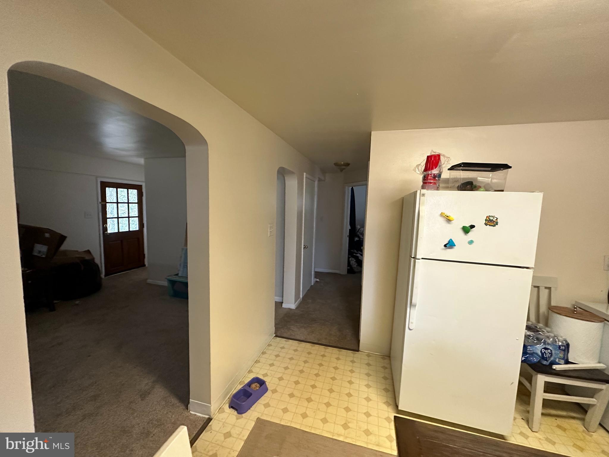 9947 Crossfield Road Hagerstown, MD 21740 - Photo 25 of 39 a refrigerator freezer sitting inside of a kitchen