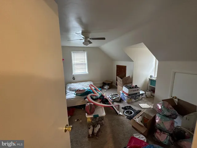 a bathroom with a sink toilet and a mirror