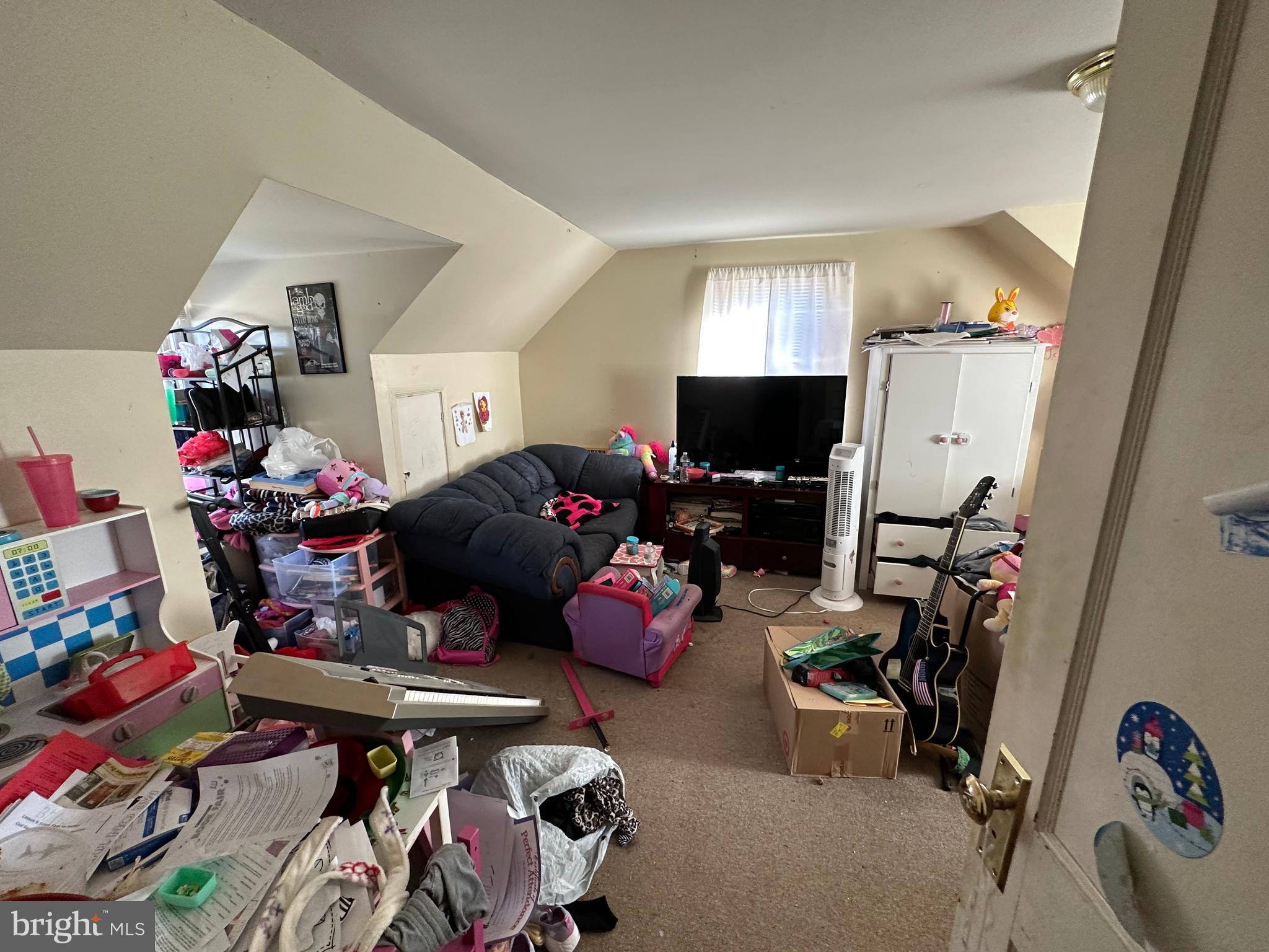 9947 Crossfield Road Hagerstown, MD 21740 - Photo 35 of 39 a room with furniture and a flat screen tv