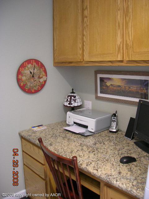58 Hunsley Road Canyon, TX 79015 - Photo 10 of 10 a kitchen with a sink and cabinets