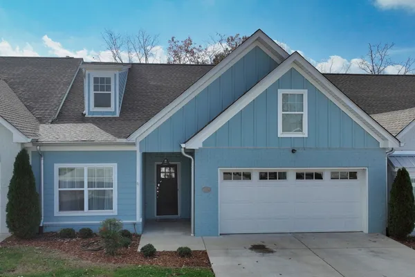 a view of a house with a garage