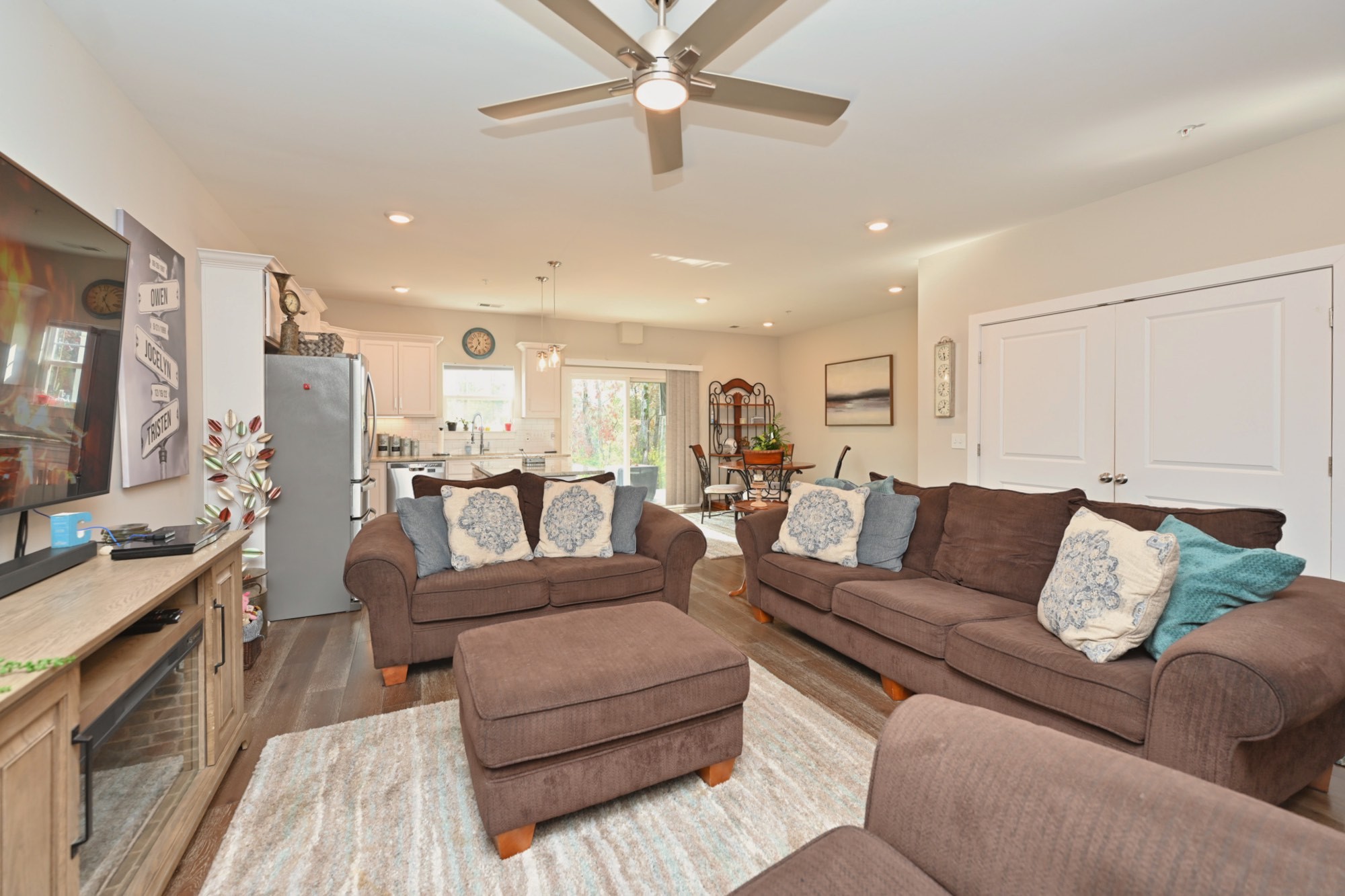 1144 Lock 4 Road, Unit J2 Gallatin, TN 37066 - Photo 11 of 28 a living room with furniture and a flat screen tv