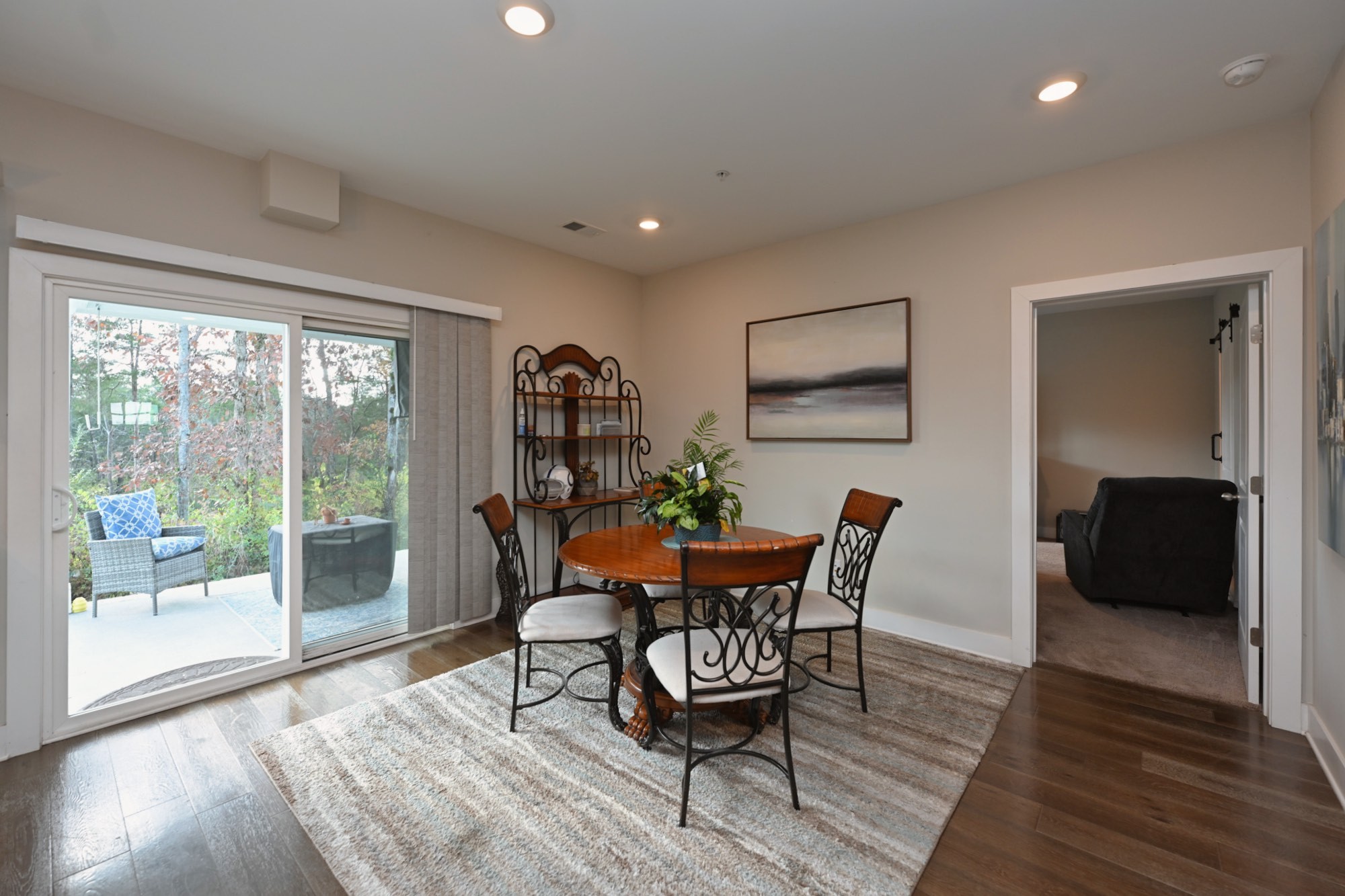 1144 Lock 4 Road, Unit J2 Gallatin, TN 37066 - Photo 18 of 28 a view of a dining room with furniture and wooden floor