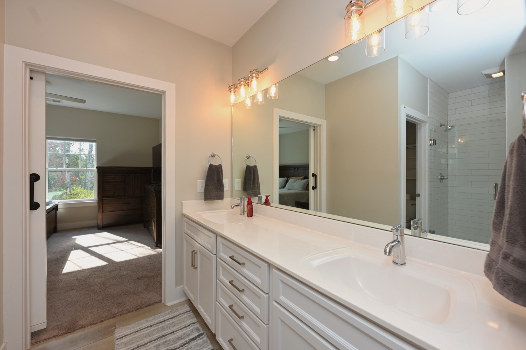 1144 Lock 4 Road, Unit J2 Gallatin, TN 37066 - Photo 22 of 28 a bathroom with a sink and mirror