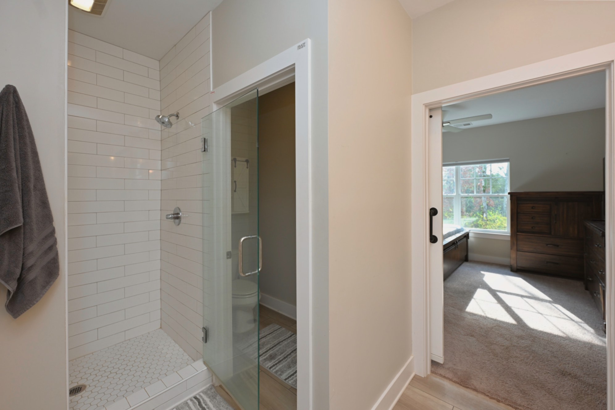 1144 Lock 4 Road, Unit J2 Gallatin, TN 37066 - Photo 23 of 28 a bathroom with a glass shower door