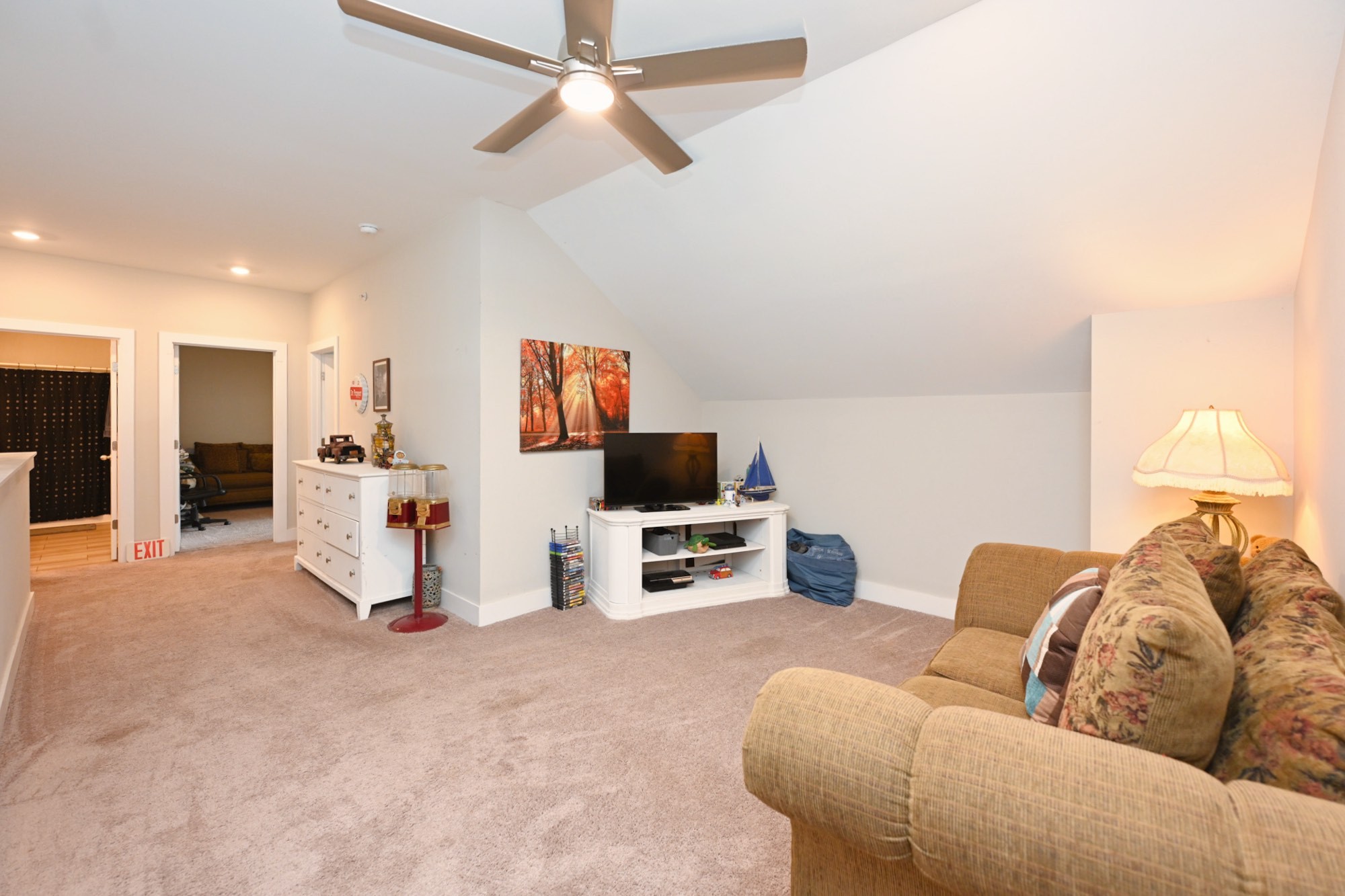 1144 Lock 4 Road, Unit J2 Gallatin, TN 37066 - Photo 27 of 28 a living room with furniture and a flat screen tv