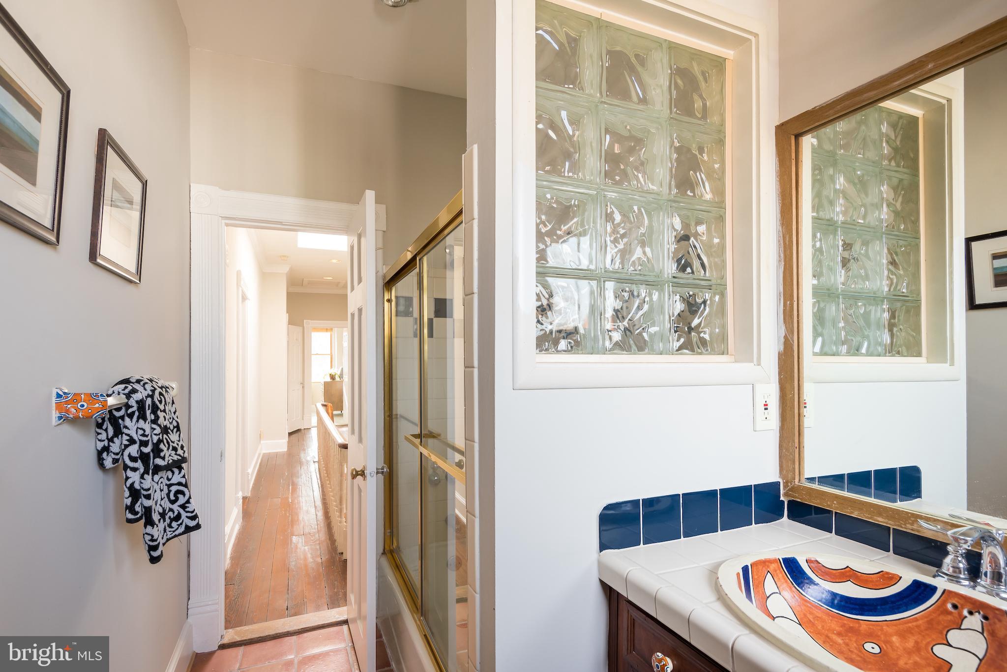 311 E Street Northeast Washington, DC 20002 - Photo 18 of 41 Front hall bath with full tub/shower