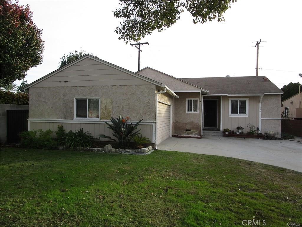 11640 Leeds Street Norwalk, CA 90650 - Photo 1 of 1 a front view of a house with a garden