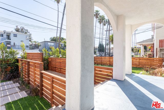 a picture of a bathroom with a mirror