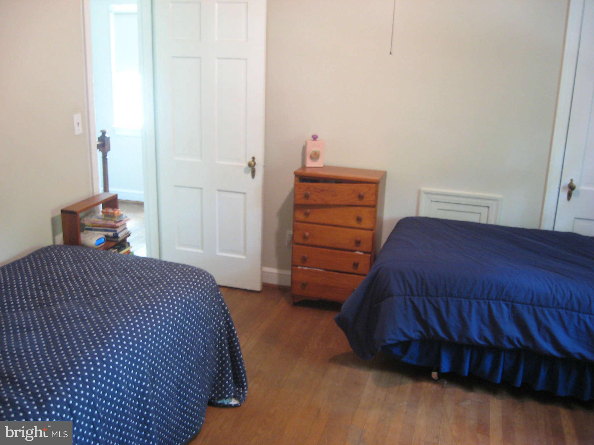 9015 Bradford Road Silver Spring, MD 20901 - Photo 17 of 25 a bedroom with a bed and a closet