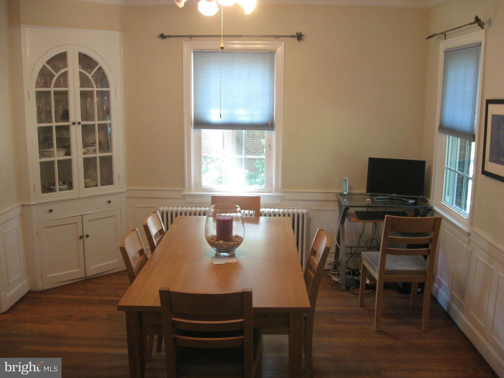 9015 Bradford Road Silver Spring, MD 20901 - Photo 6 of 25 a view of a dining room with furniture and a window