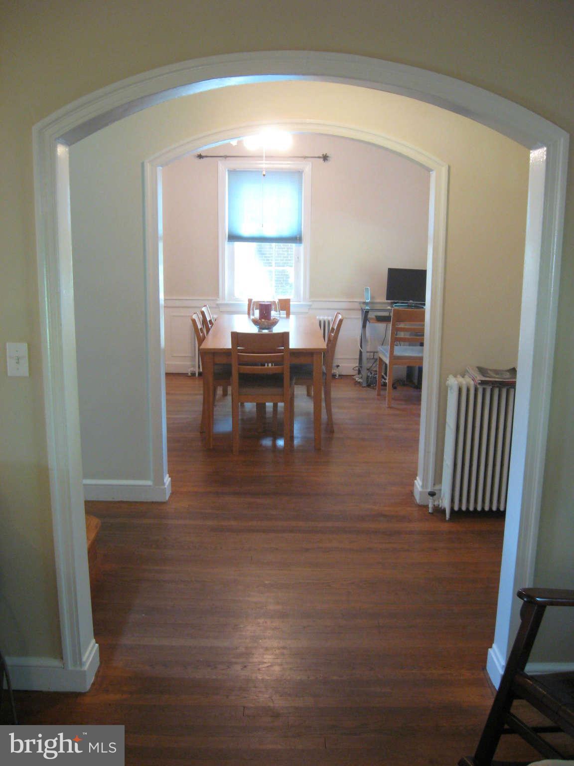 9015 Bradford Road Silver Spring, MD 20901 - Photo 9 of 25 a view of a dining room with furniture and window