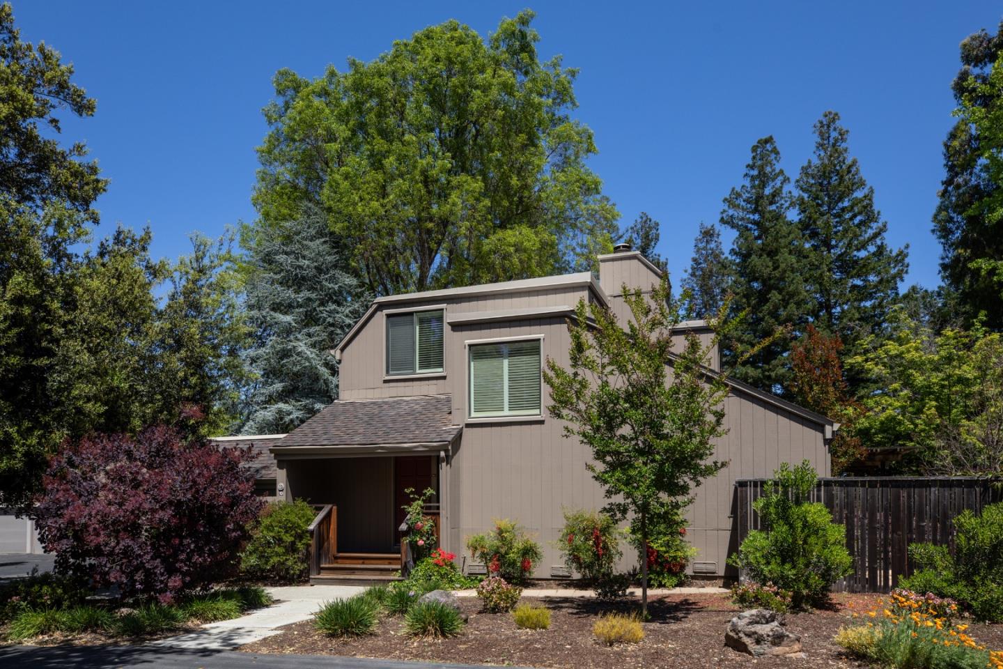 10 Farm Road Los Altos, CA 94024 - Photo 1 of 31 a front view of a house with garden
