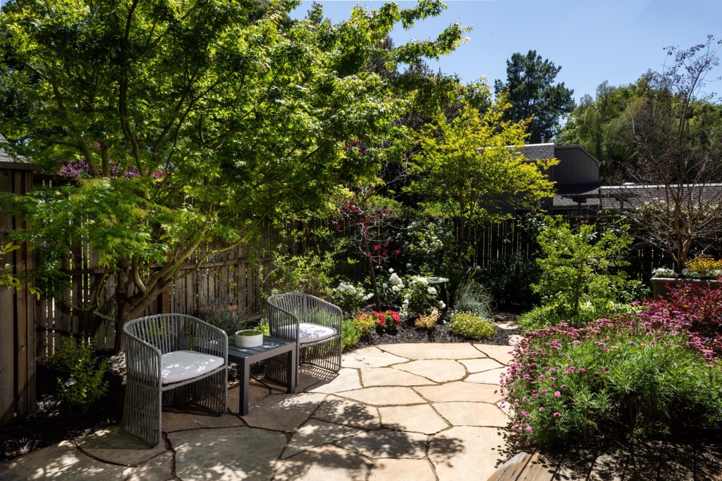 10 Farm Road Los Altos, CA 94024 - Photo 17 of 31 a view of a chairs and tables in the backyard
