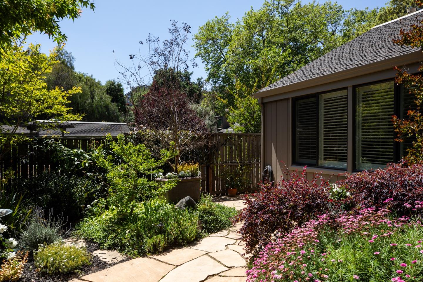 10 Farm Road Los Altos, CA 94024 - Photo 23 of 31 a view of a house with a small yard and plants