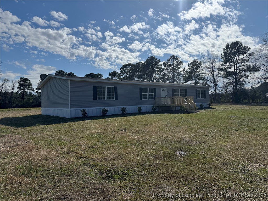 280 Cain Road St. Pauls, NC 28384 - Photo 1 of 23 a view of a backyard