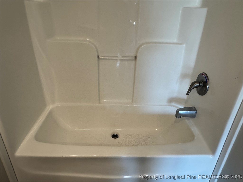 280 Cain Road St. Pauls, NC 28384 - Photo 21 of 23 a close view of a bathtub in bathroom