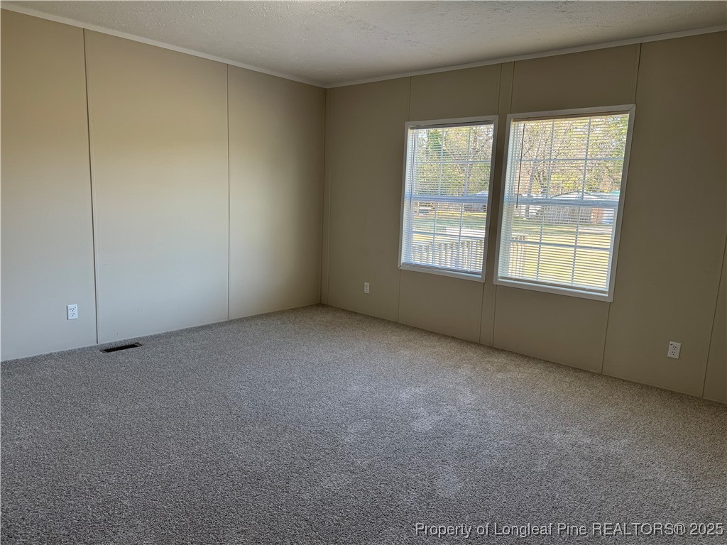 280 Cain Road St. Pauls, NC 28384 - Photo 22 of 23 a view of an empty room with a window