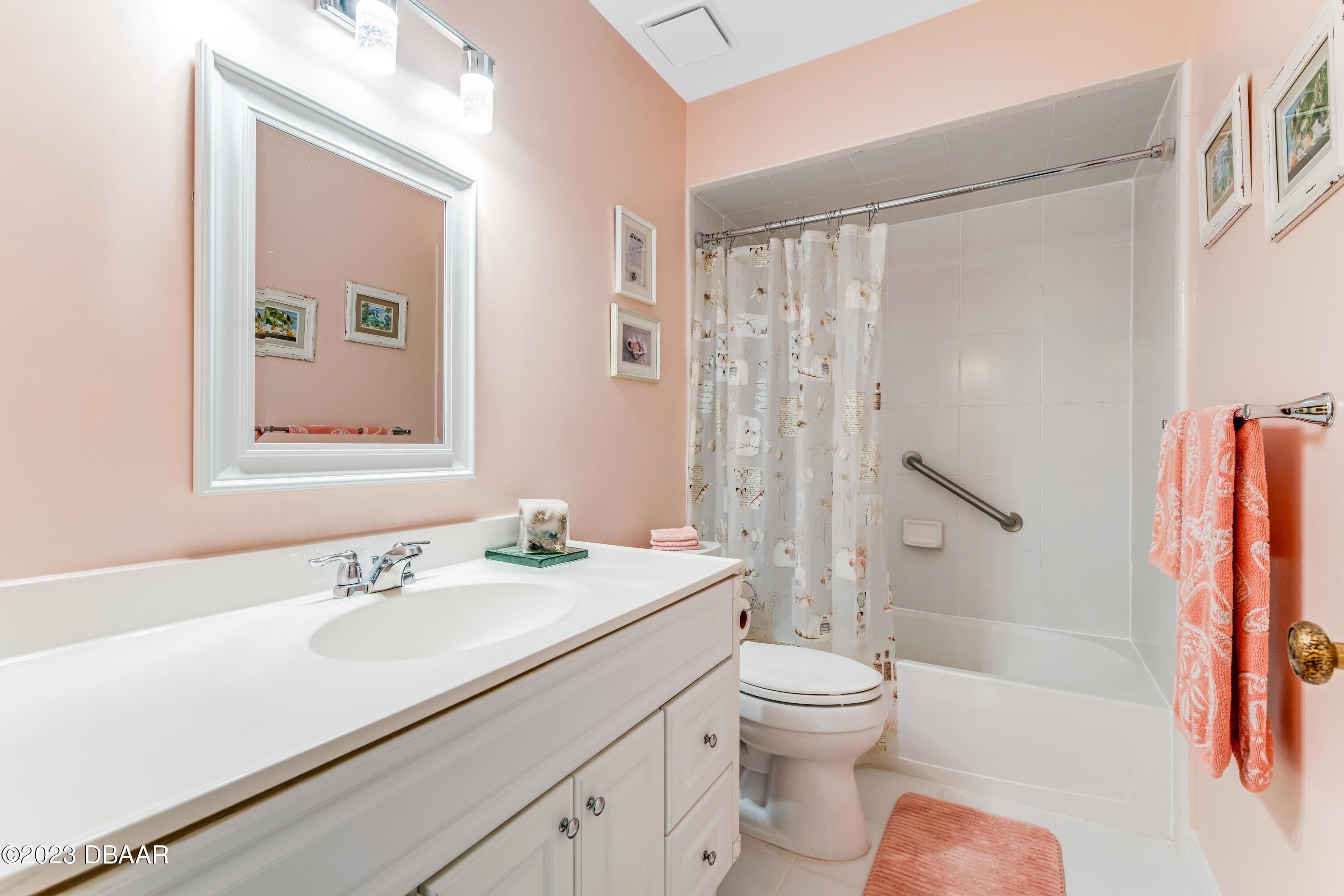 11 Eagle Drive Ormond Beach, FL 32174 - Photo 16 of 25 a bathroom with a sink a toilet and shower