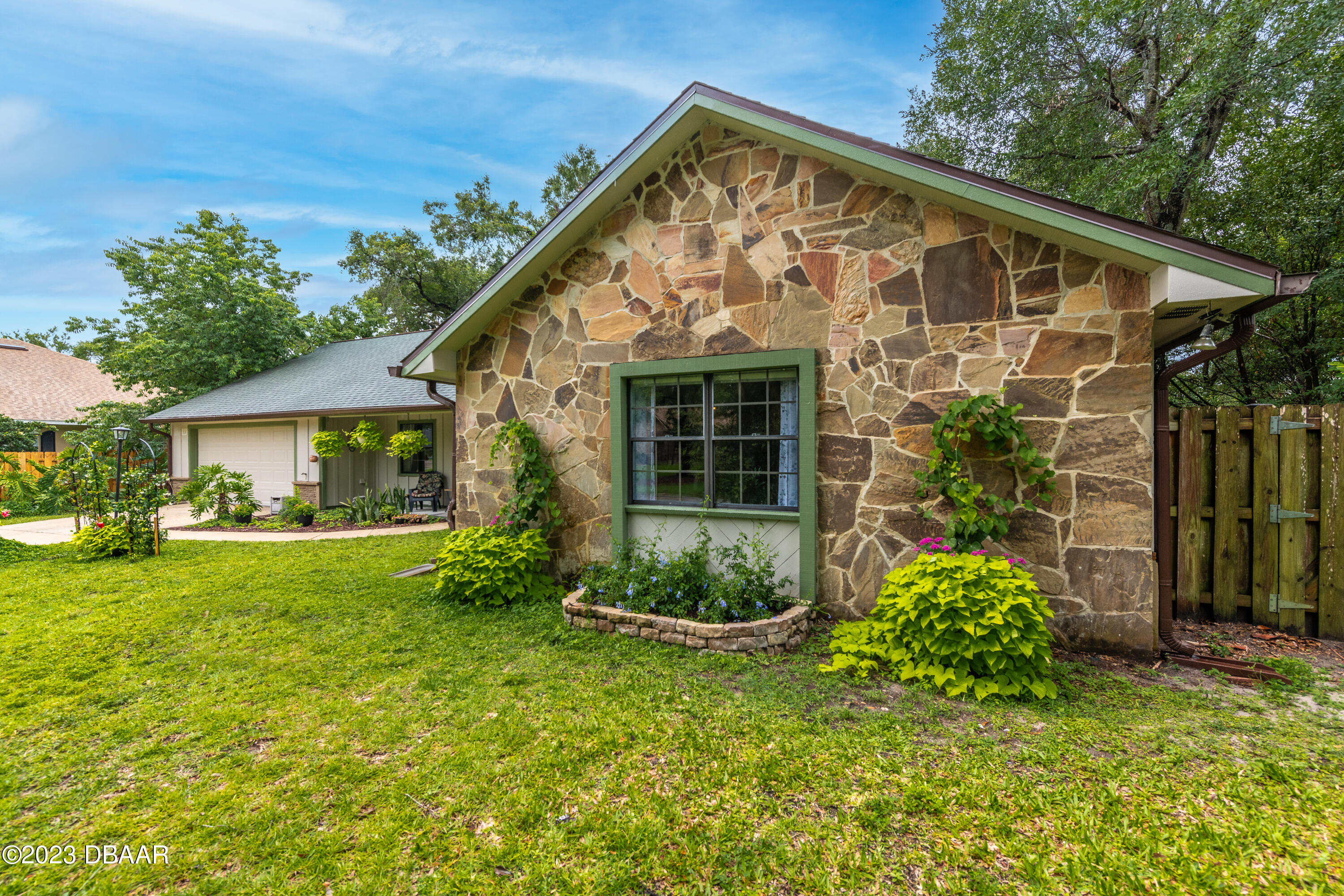 11 Eagle Drive Ormond Beach, FL 32174 - Photo 2 of 25 a view of a house with backyard