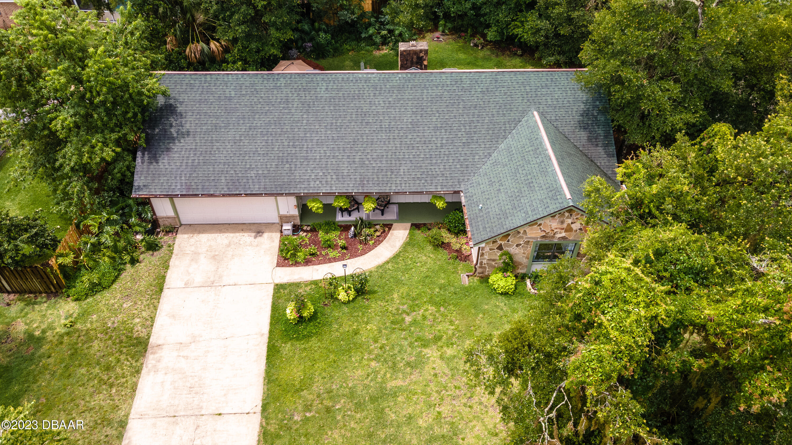 11 Eagle Drive Ormond Beach, FL 32174 - Photo 3 of 25 an aerial view of a house with swimming pool and large trees