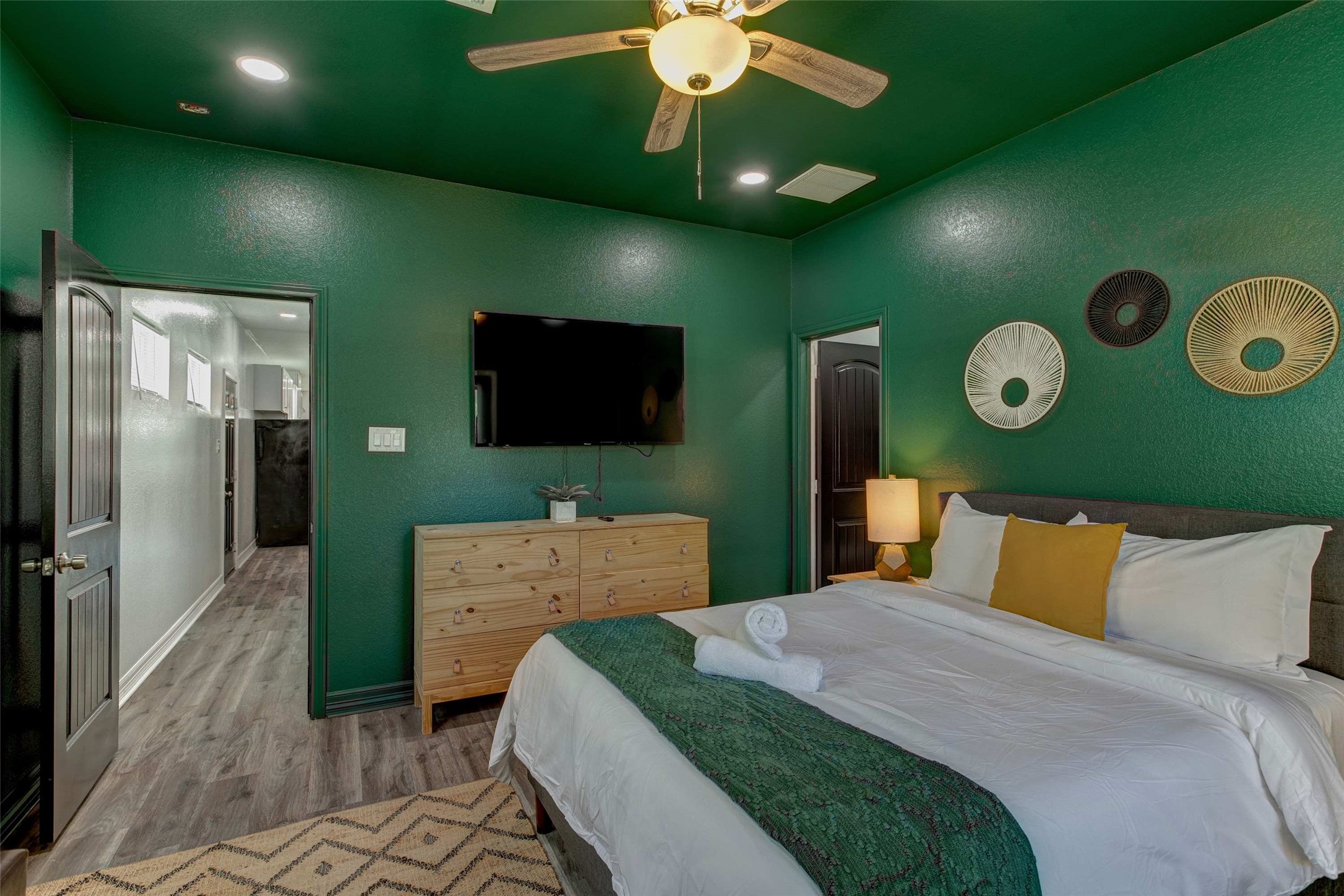 9816 Masterson Street Houston, TX 77029 - Photo 12 of 23 a bedroom with a bed and a television