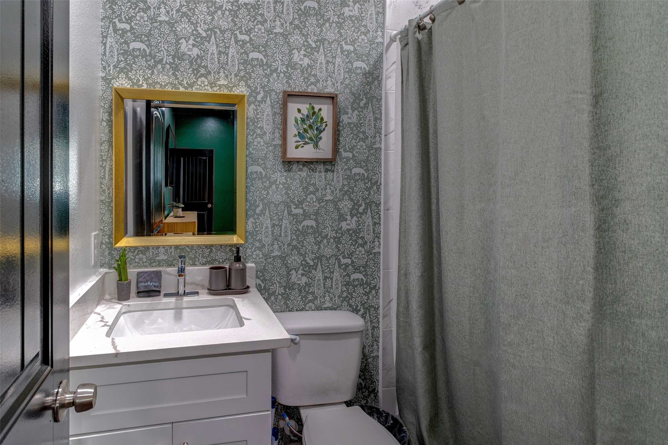 9816 Masterson Street Houston, TX 77029 - Photo 15 of 23 a bathroom with a sink toilet and mirror