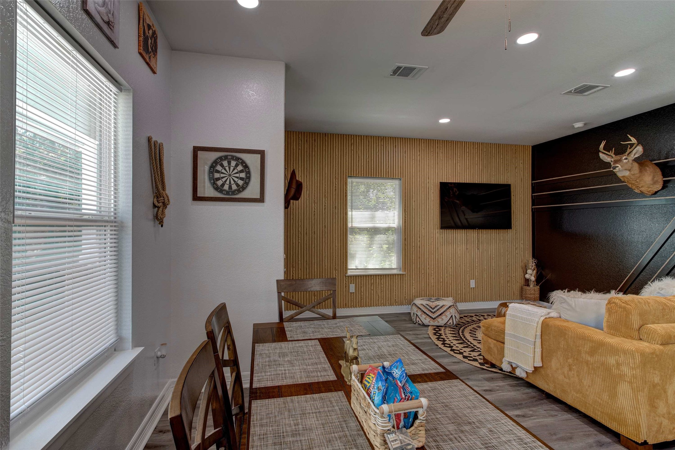 9816 Masterson Street Houston, TX 77029 - Photo 9 of 23 a living room with furniture and a flat screen tv