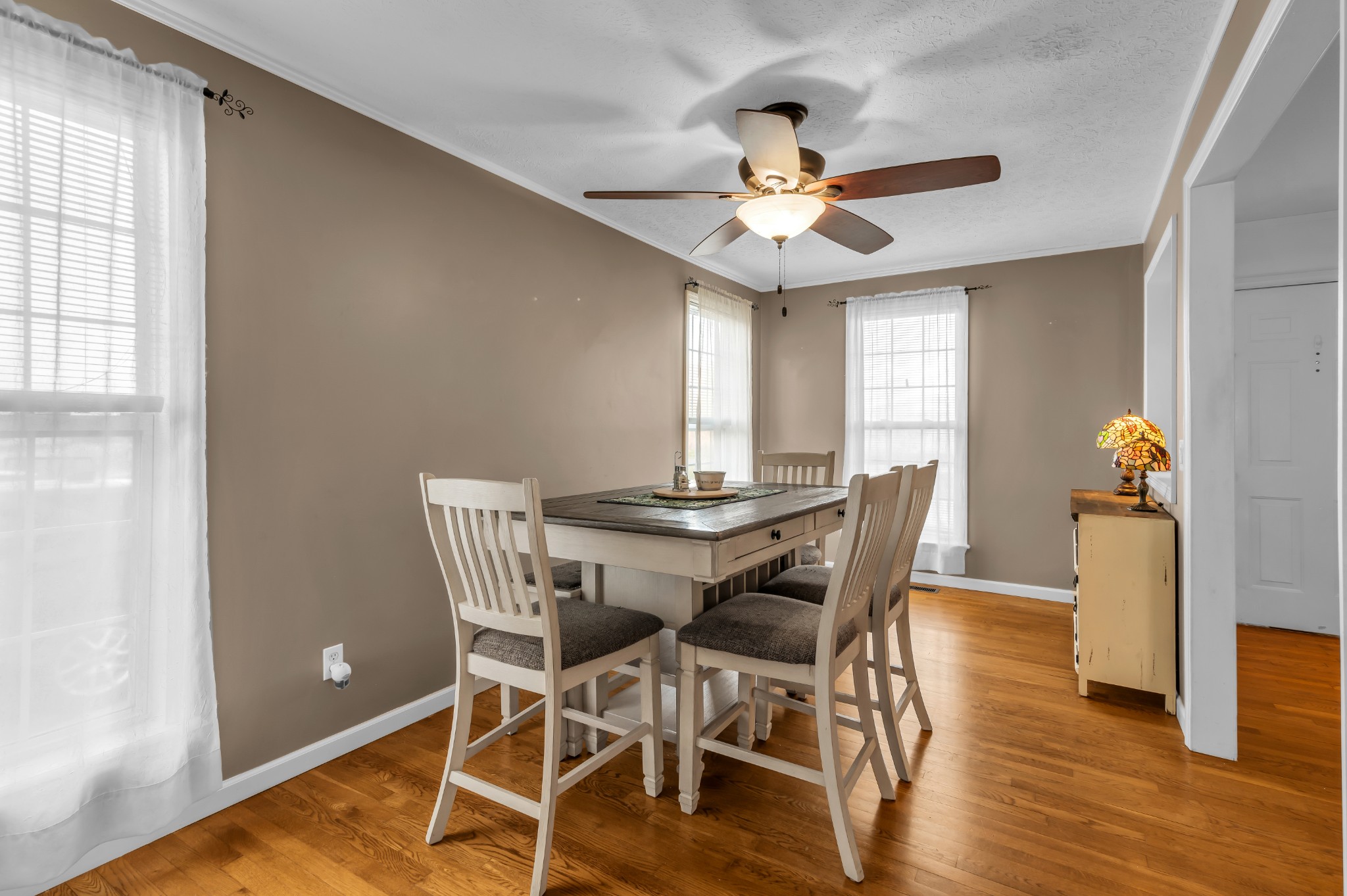 672 Old Snow Hill Road Dowelltown, TN 37059 - Photo 11 of 54 a view of a dining room with furniture window and wooden floor