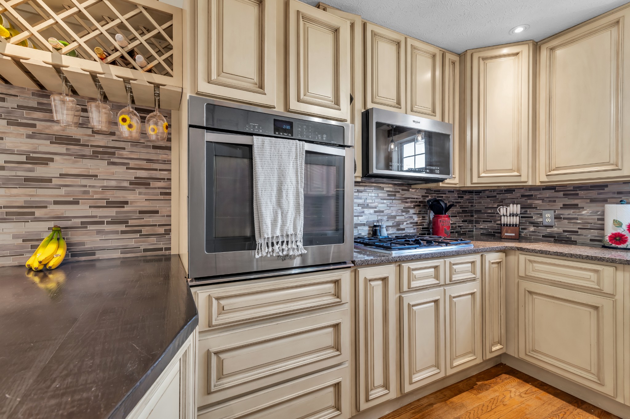 672 Old Snow Hill Road Dowelltown, TN 37059 - Photo 13 of 54 a kitchen with stainless steel appliances granite countertop a sink a stove and cabinets
