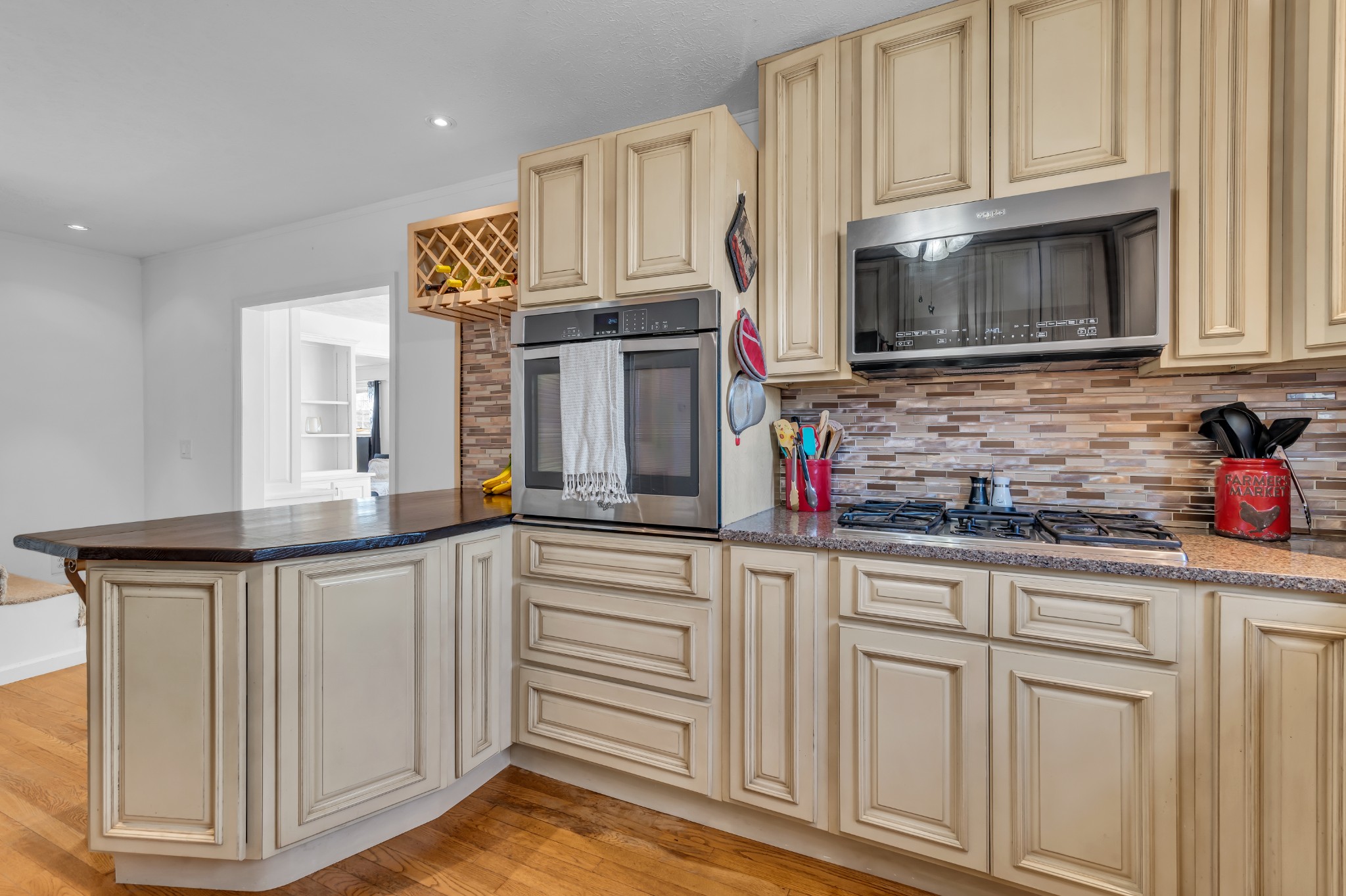 672 Old Snow Hill Road Dowelltown, TN 37059 - Photo 15 of 54 a kitchen with stainless steel appliances granite countertop white cabinets a sink and dishwasher