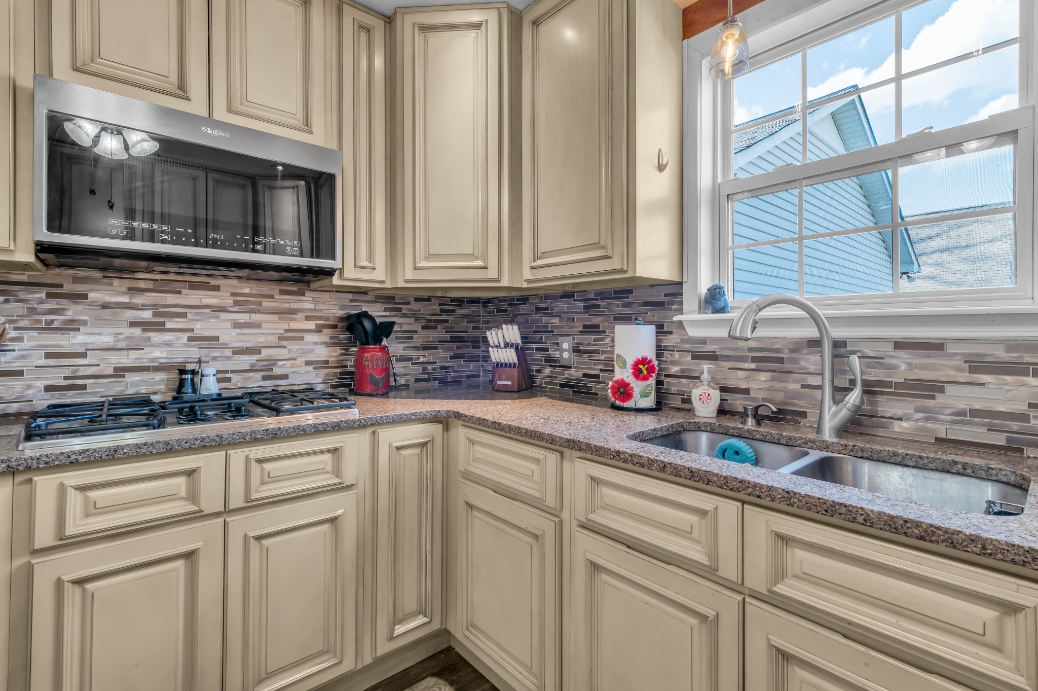 672 Old Snow Hill Road Dowelltown, TN 37059 - Photo 16 of 54 a kitchen with stainless steel appliances granite countertop white cabinets a sink and dishwasher
