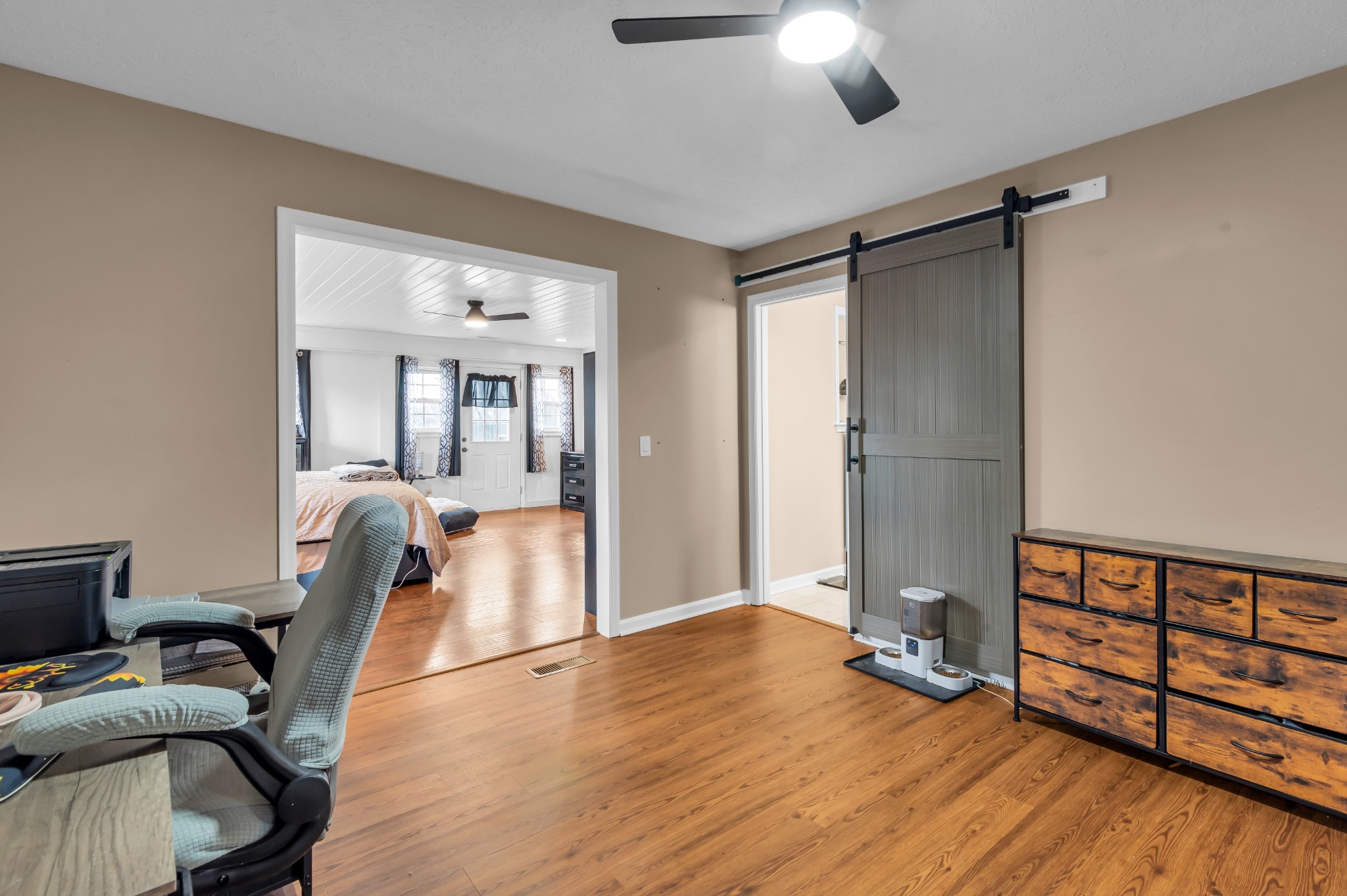 672 Old Snow Hill Road Dowelltown, TN 37059 - Photo 21 of 54 a view of a workspace with furniture and wooden floor