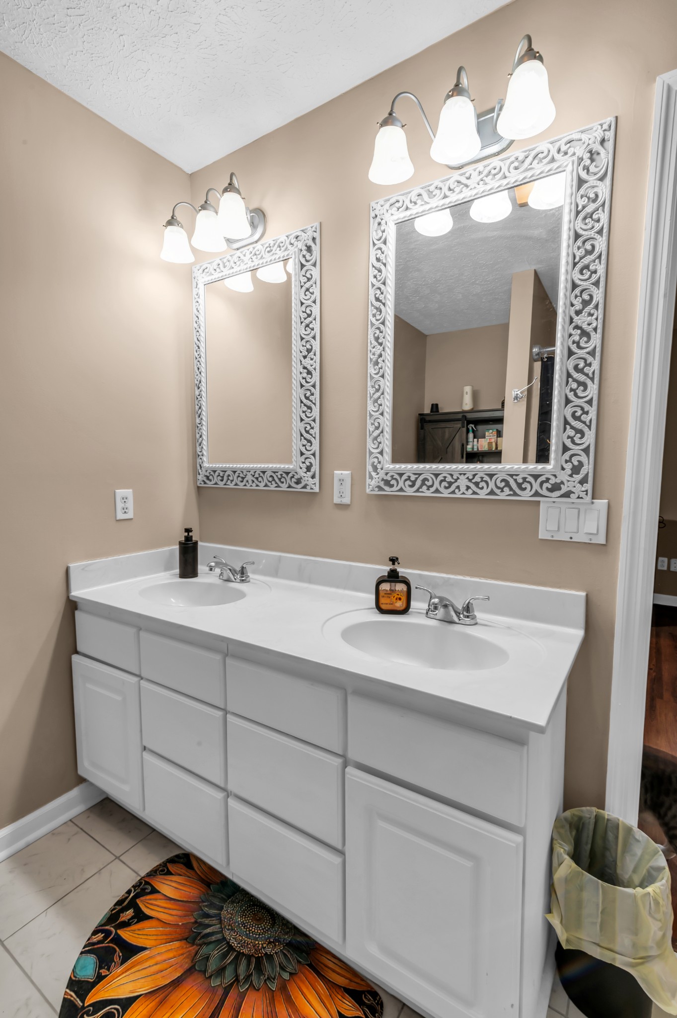 672 Old Snow Hill Road Dowelltown, TN 37059 - Photo 23 of 54 a bathroom with a double vanity sink mirror and