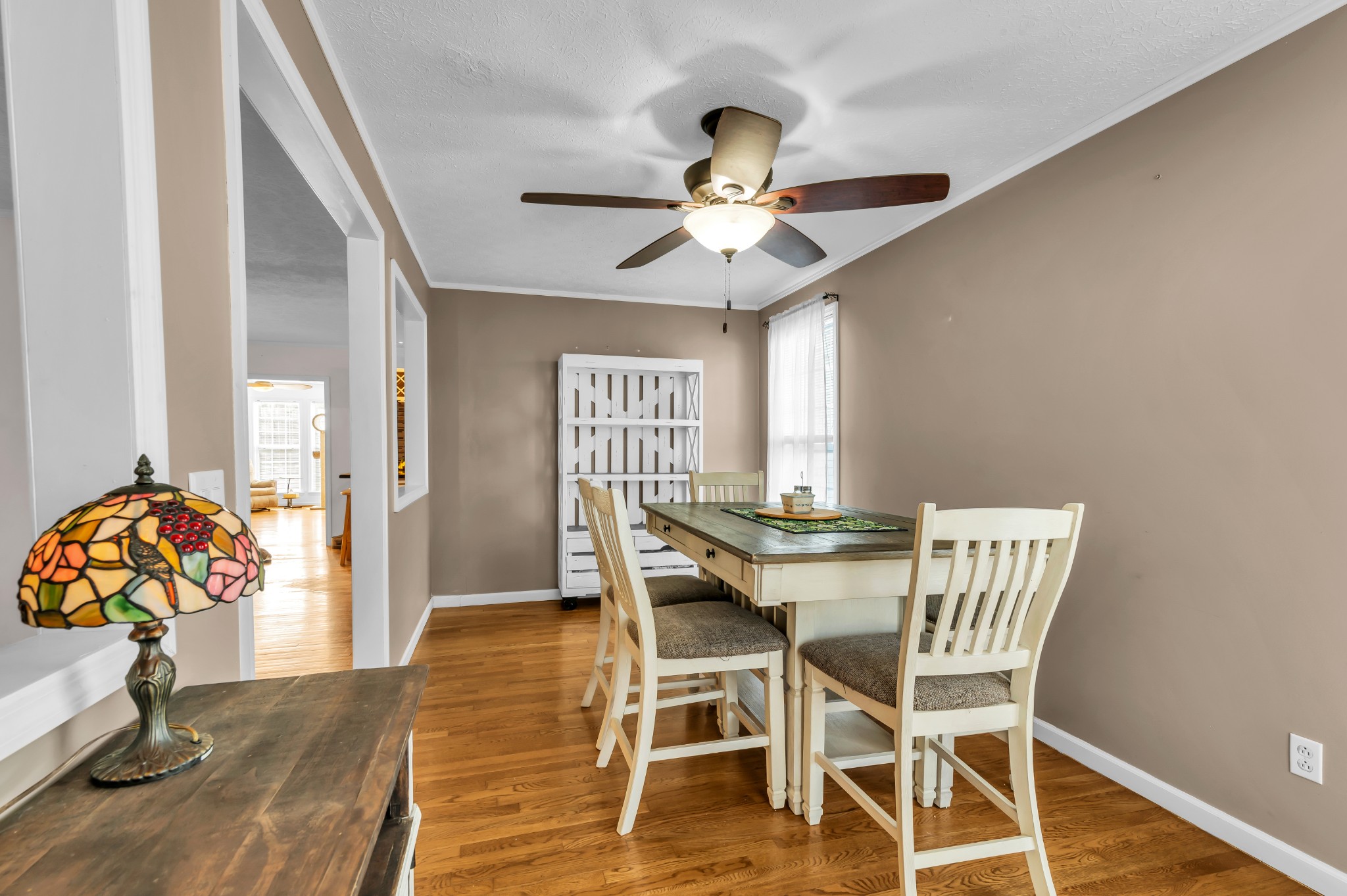 672 Old Snow Hill Road Dowelltown, TN 37059 - Photo 10 of 54 a view of a dining room with furniture and wooden floor