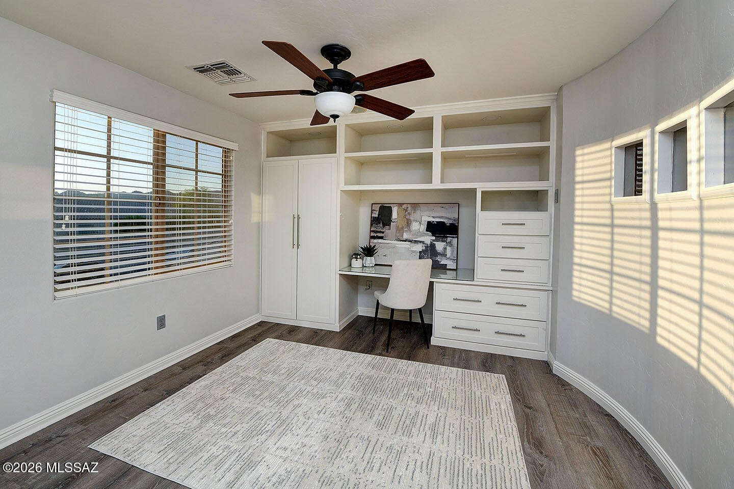 13464 North Piemonte Way Oro Valley, AZ 85755 - Photo 21 of 33 a bedroom with a bed and a window