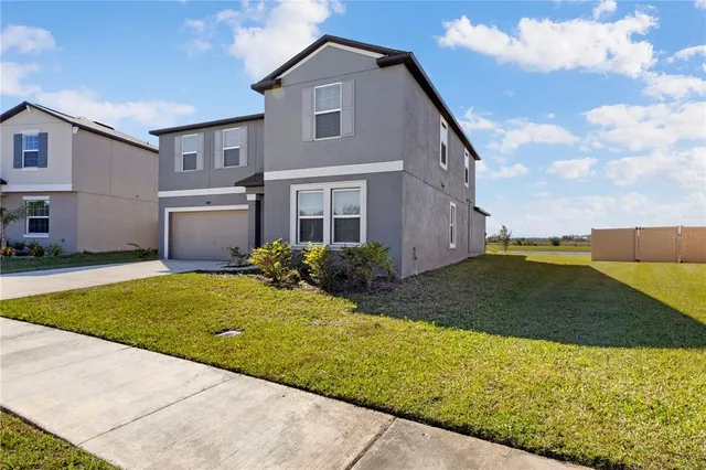 a house view with a garden space