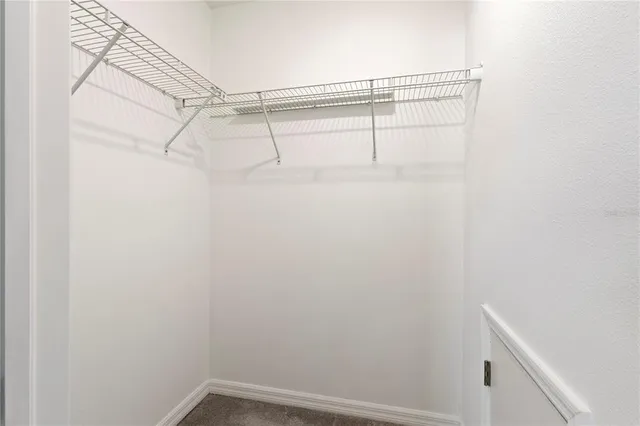 a view of a room with racks on the wall