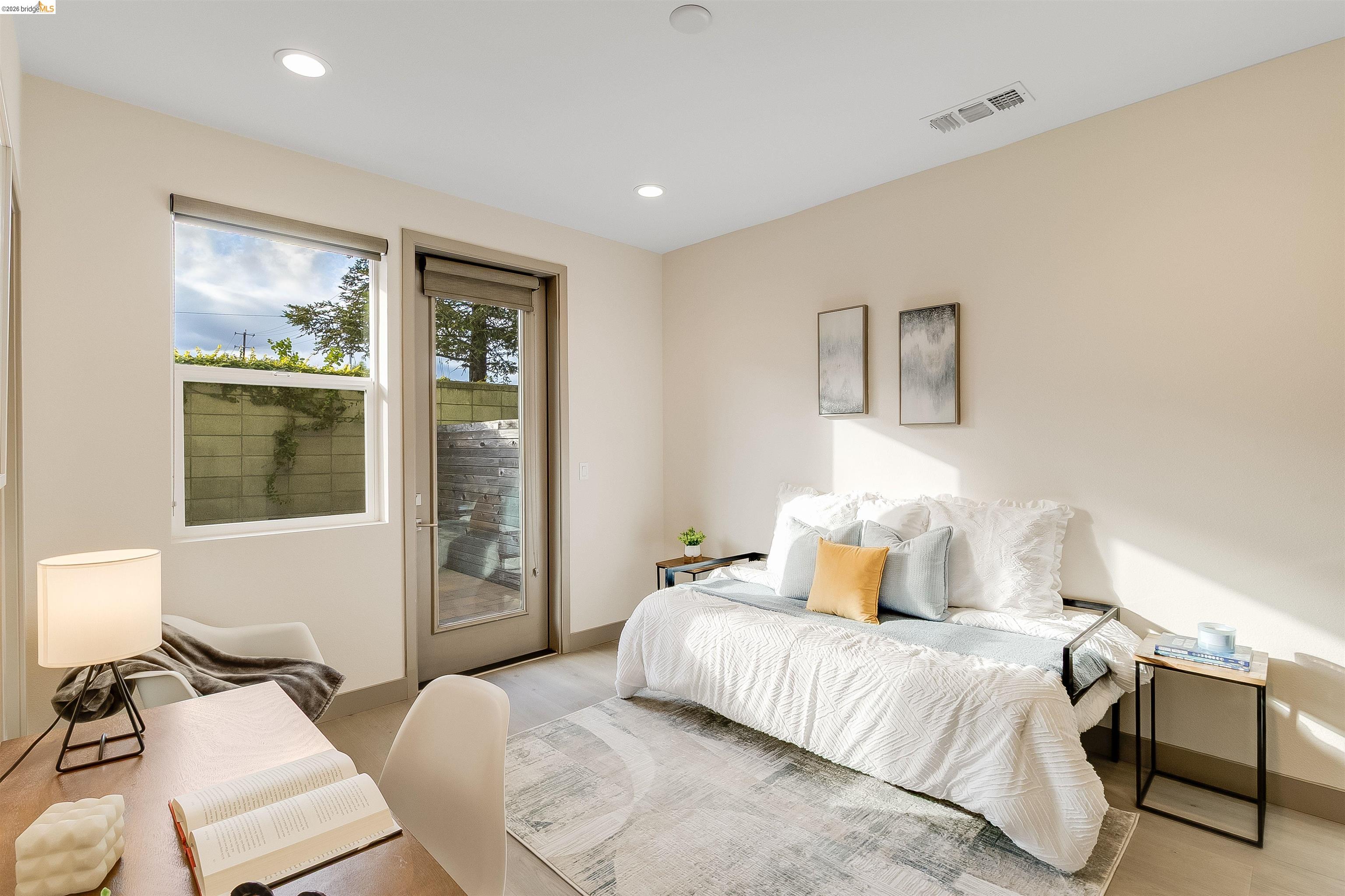 1357 Pullman Way Oakland, CA 94607 - Photo 6 of 37 Interior room featuring light-toned walls, recessed lighting, and wood-finish flooring